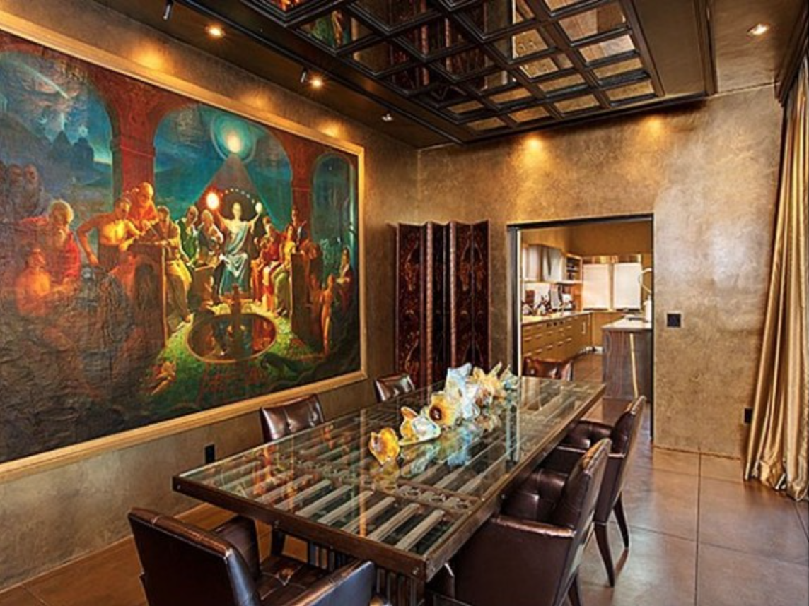Dining area mural befitting the home's mysterious vibe