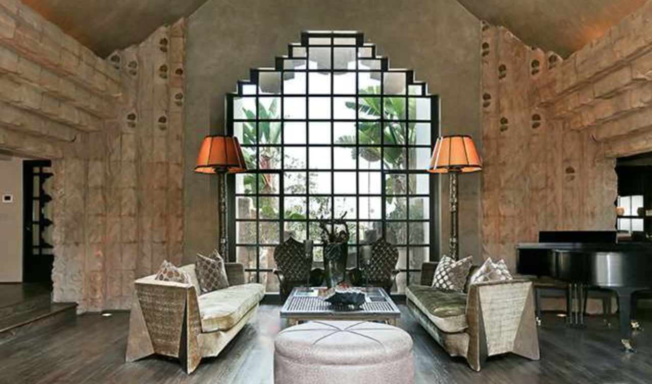 Tall ceilings, ample light and an open-air feel is a highlight of the home. Featured is Frank Lloyd Wright-designed furniture.