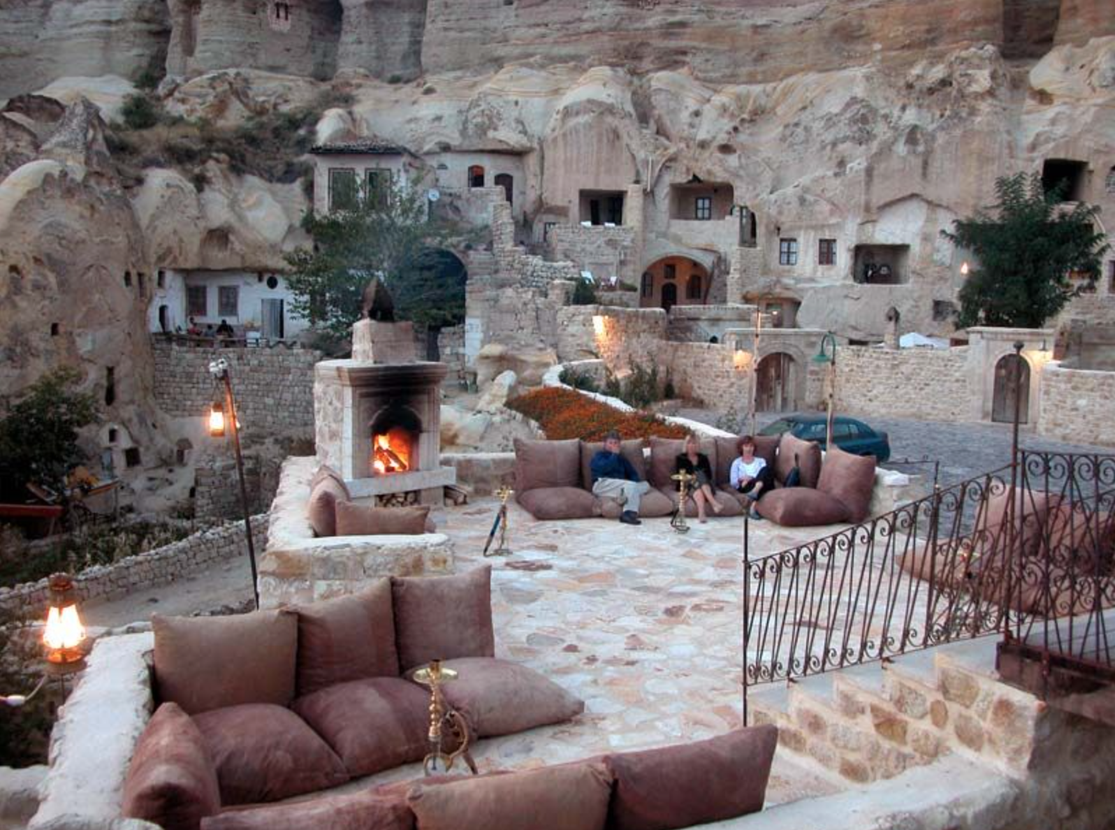 Hotel rooms and public spaces are beautified with natural nooks, archways and stone fireplaces.