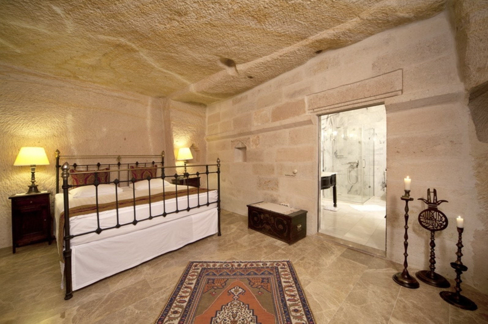 Hotel suites feature marble floors, hand-laced curtains, antique chests handcrafted writing desks and old kilim carpets.